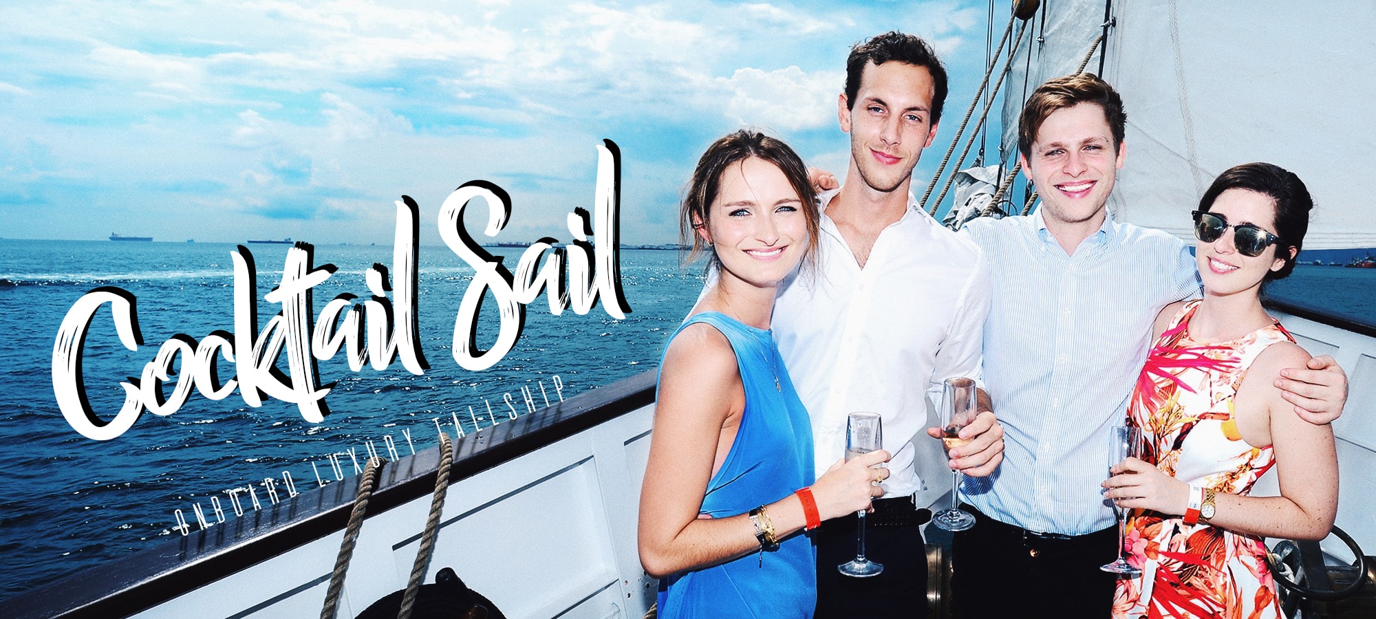 cocktail sail with group of friends slider on royal albatross
