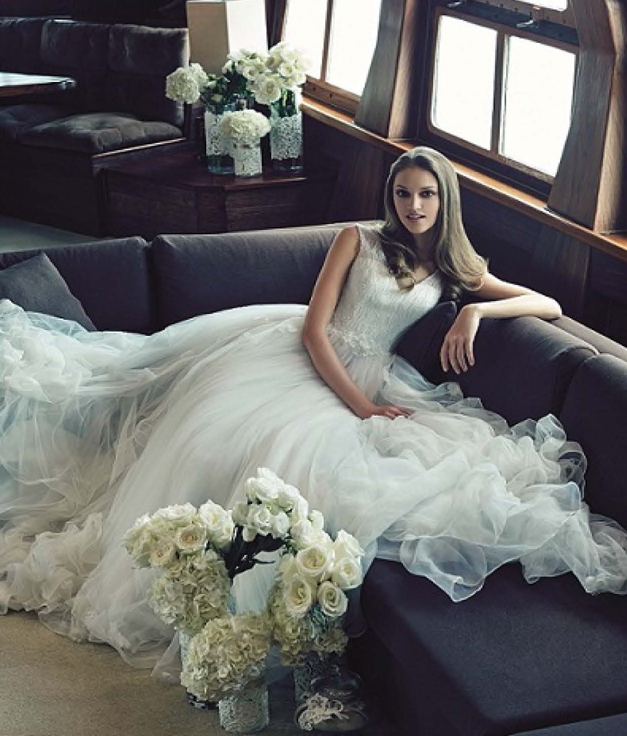 beautiful caucasian bride sitting on grand salon royal albatross